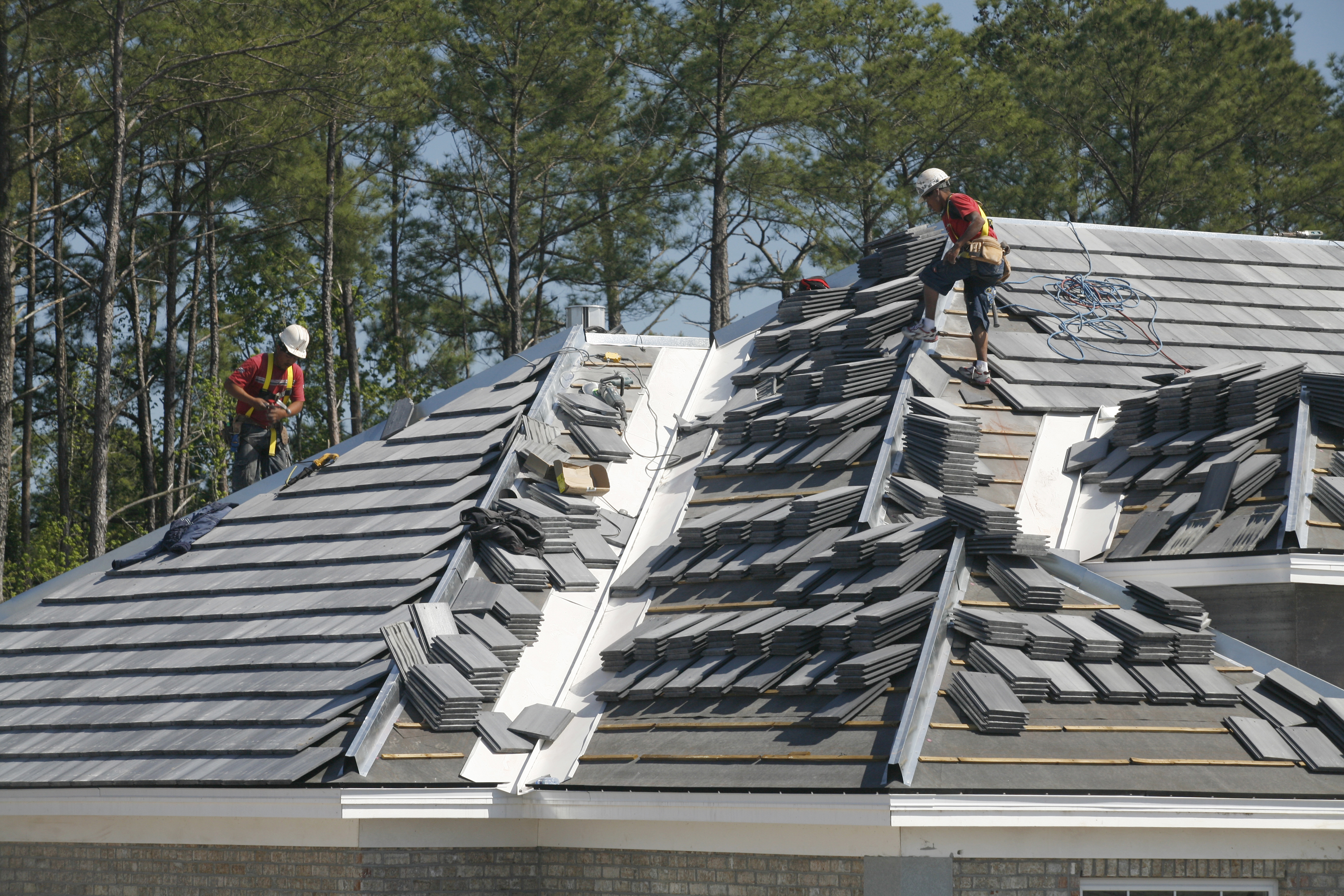 Contractors replacing roof