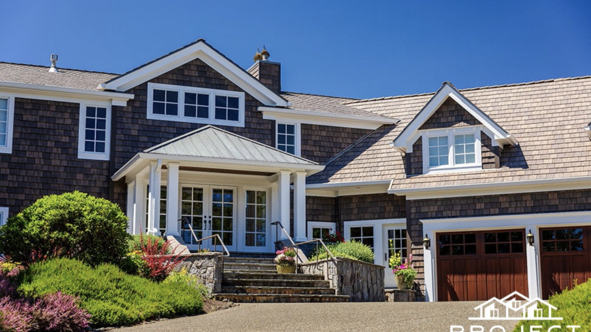 Thanks to its DaVinci composite shake siding and composite shake roof this home has the ideal protection for rugged coastal conditions. 