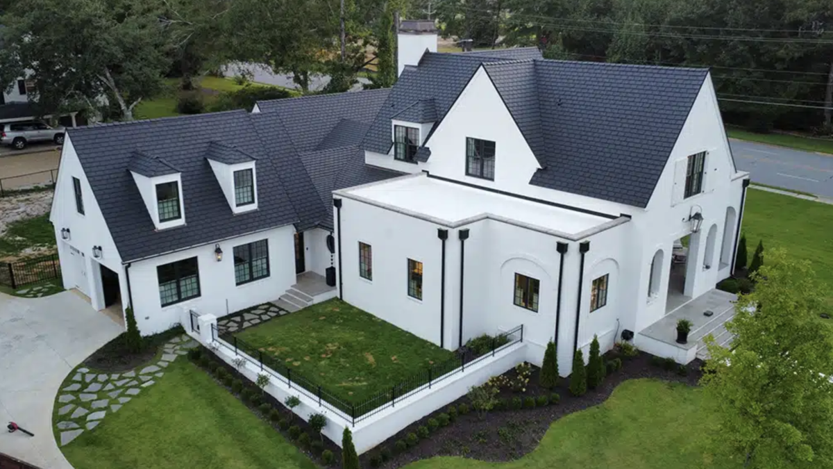 Roofer recommended Province Slate helped these homeowners pivot from a roofing disaster to a roof that complements their dream home. 