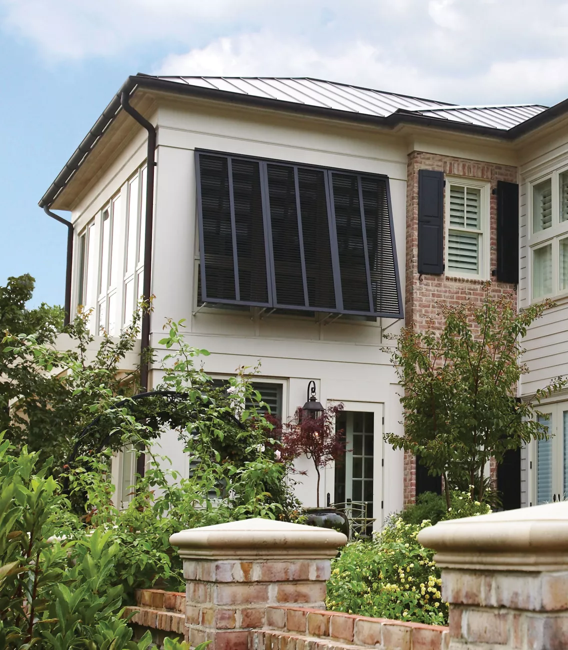 beach home with black bahama shutters